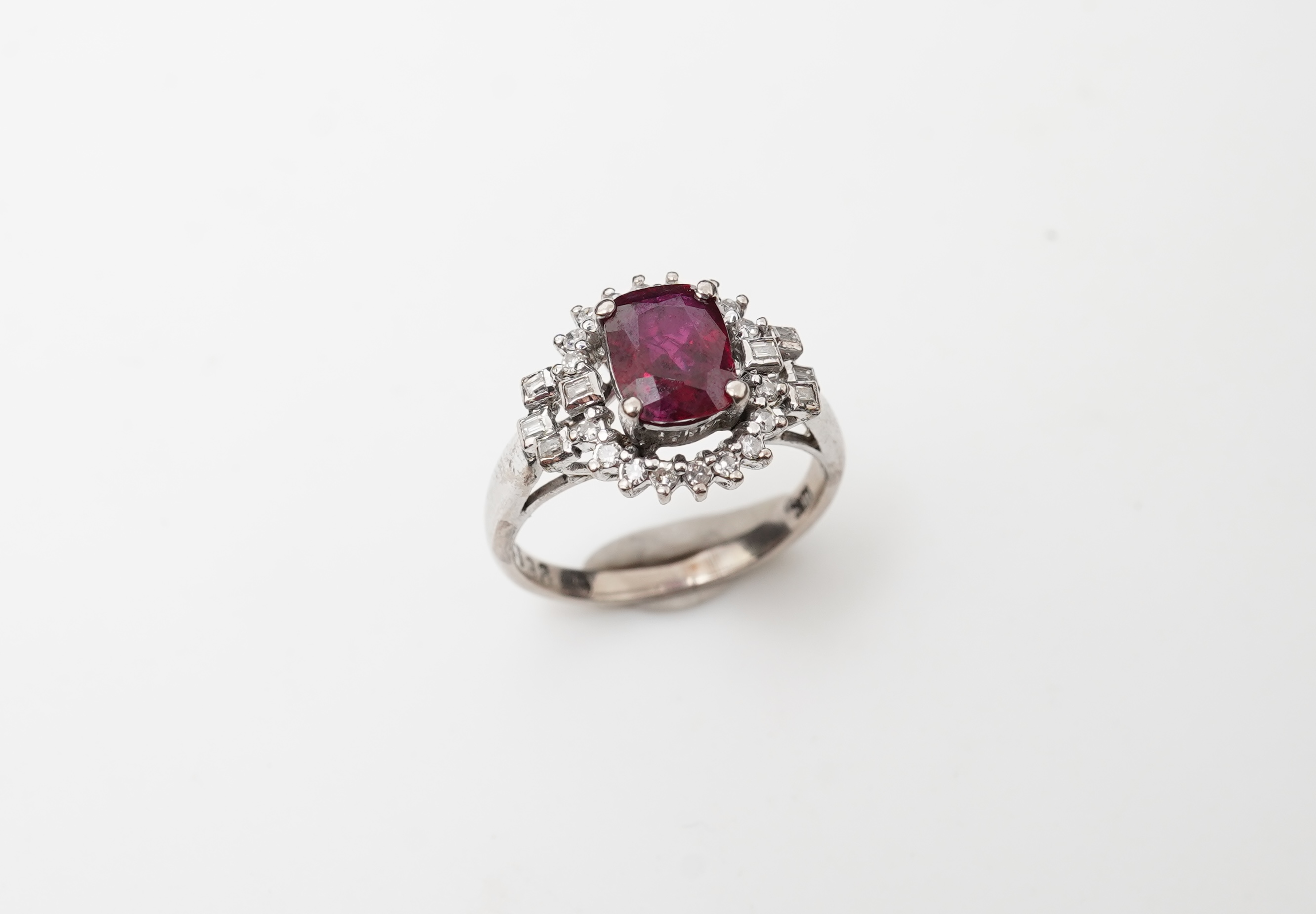 A ruby and diamond ring